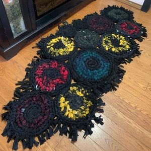 Handmade upcycled fabric rug.